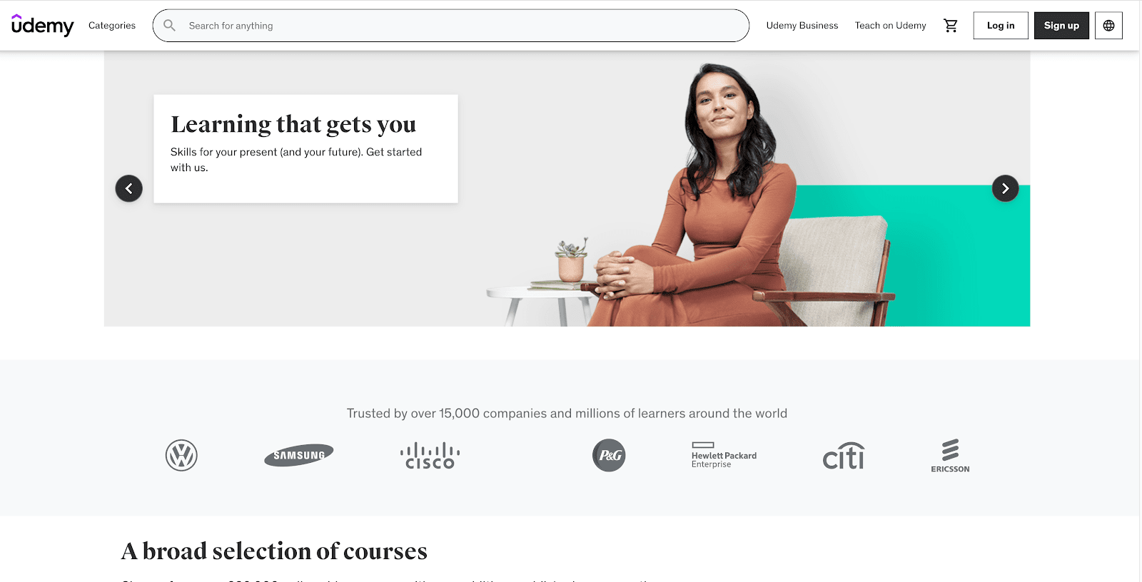 A preview of the udemy website homepage, showing a girl on the hero section with a message saying Learning that gets you