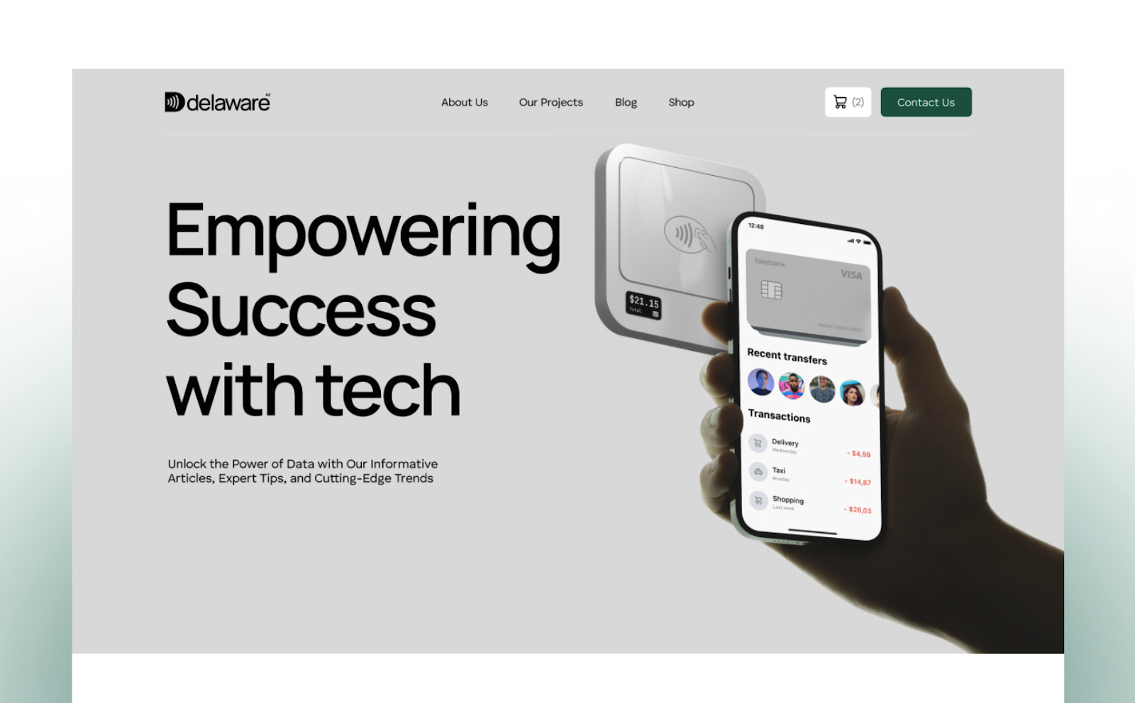The "Delaware" webflow agency template homepage design displaying the phrase "empowering success with tech" with an image of a hand holding a smartphone showing financial transactions.